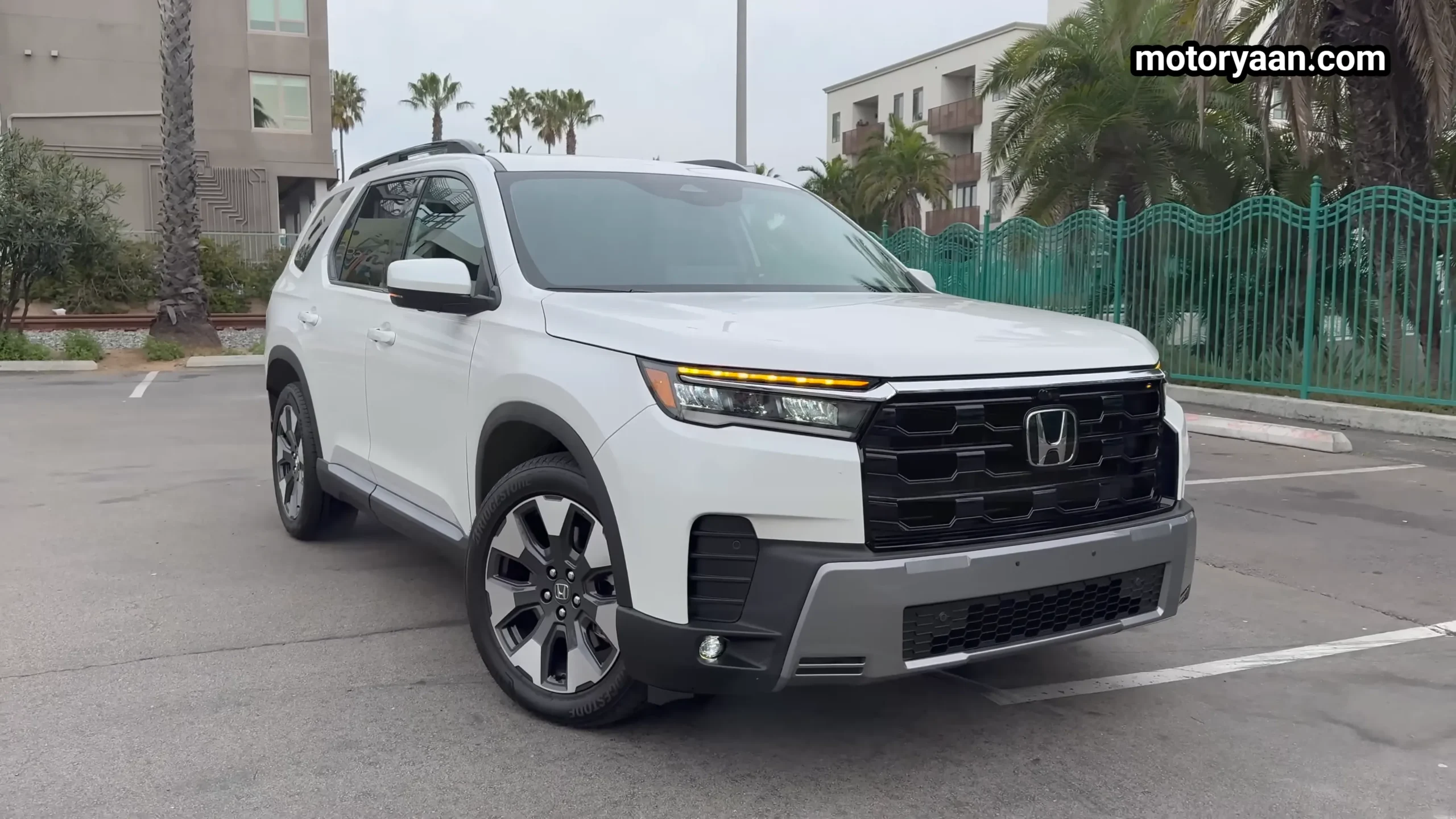 2026 Honda Pilot front and side profile showing updated grille design and SUV stance
