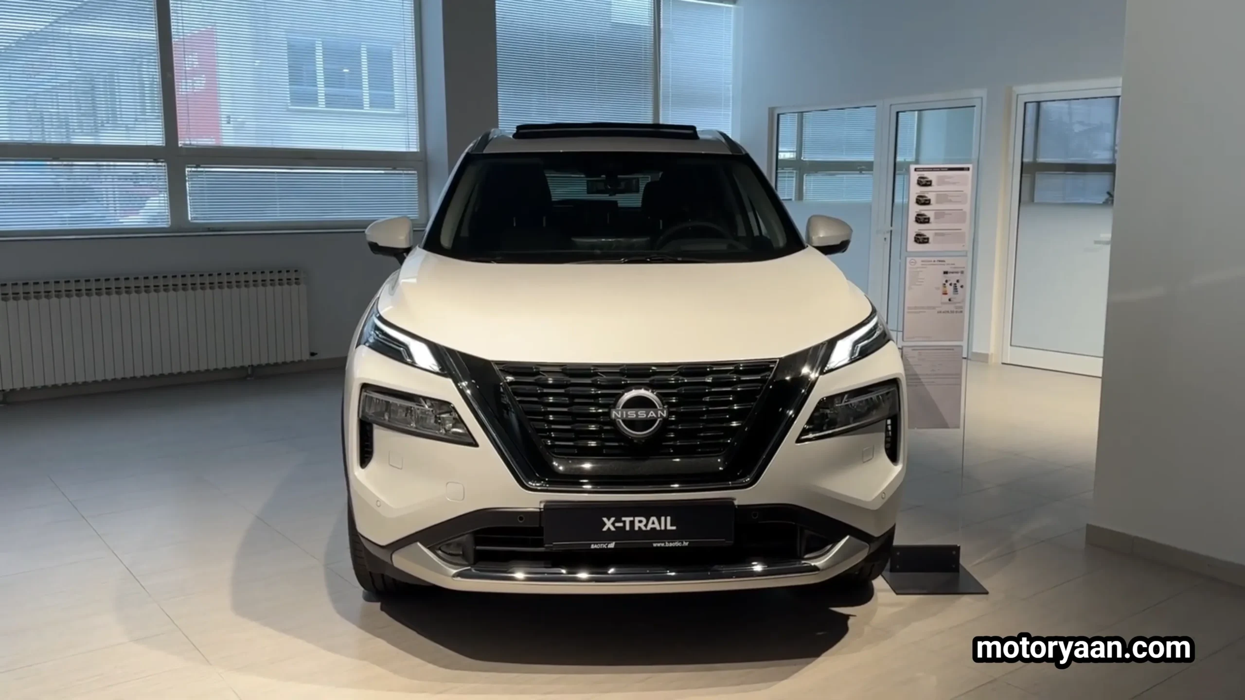 2026 Nissan X Trail e Power front profile showing grille design and LED lighting