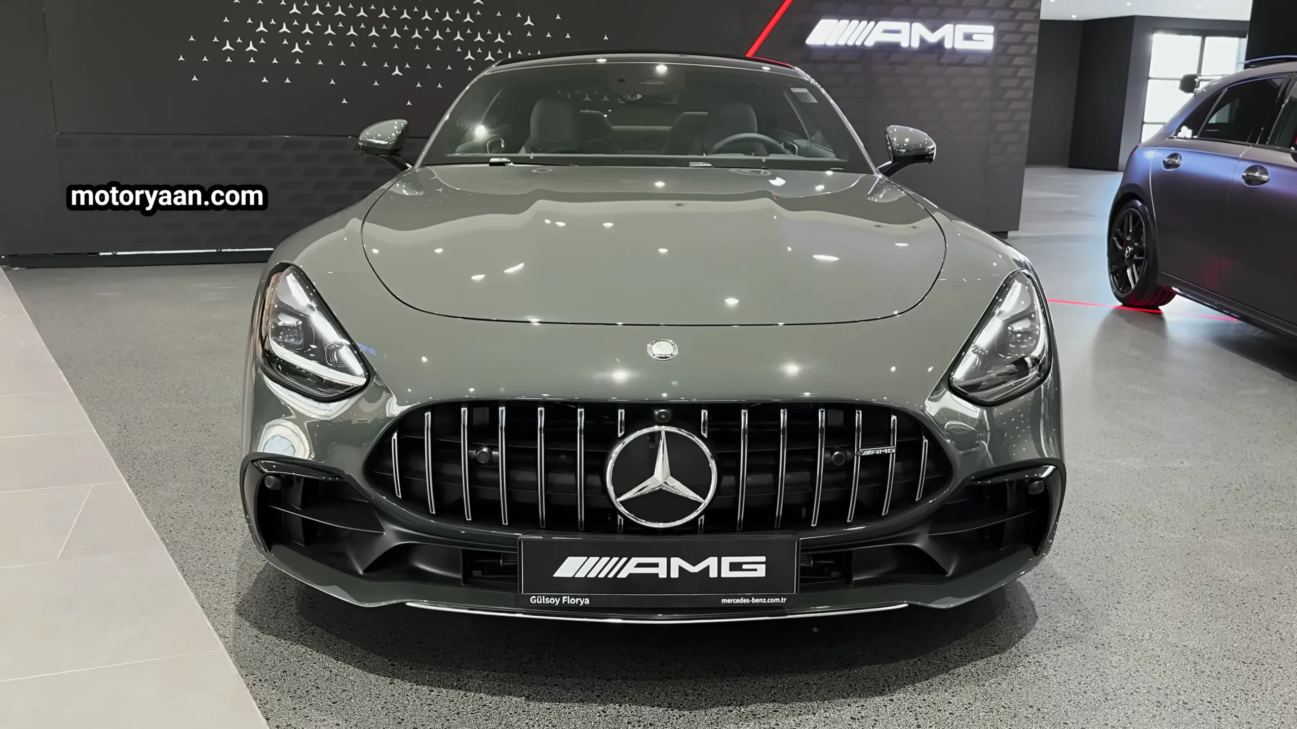 2026 Mercedes AMG GT 43 front profile showcasing AMG grille and aggressive coupe stance