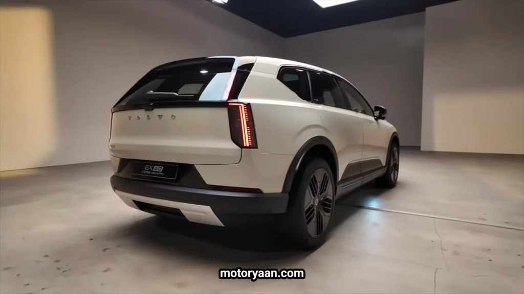 2027 Volvo EX60 Cross Country rear three quarter view showing side cladding