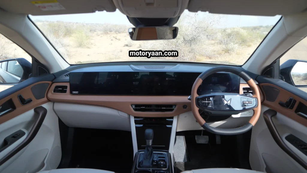Mahindra XUV 7XO facelift dashboard with triple screen setup and center console layout