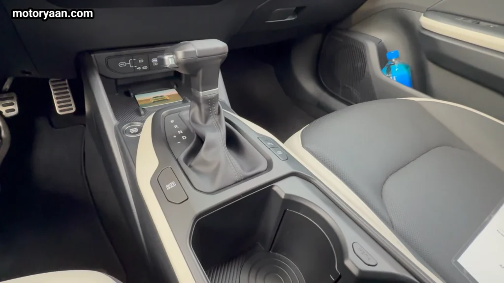 2026 Kia K4 GT Line Turbo gear selector and cup holders in center console