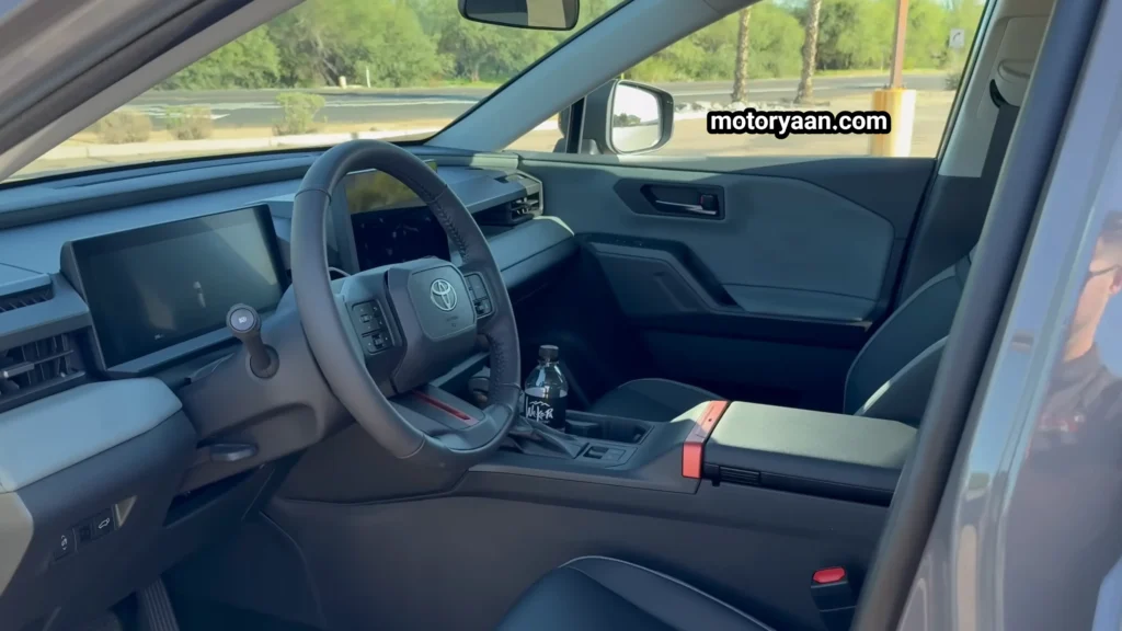 2026 Toyota RAV4 Woodland interior dashboard steering wheel and center console