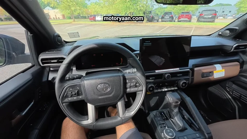 2026 Toyota 4Runner Review front interior dashboard steering wheel and center console