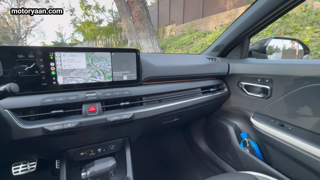 2026 Kia K4 GT Line Turbo passenger side dashboard and infotainment display