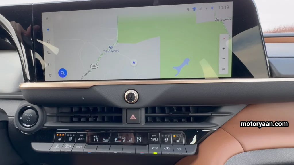 2026 Toyota Crown Signia infotainment system with physical climate control buttons