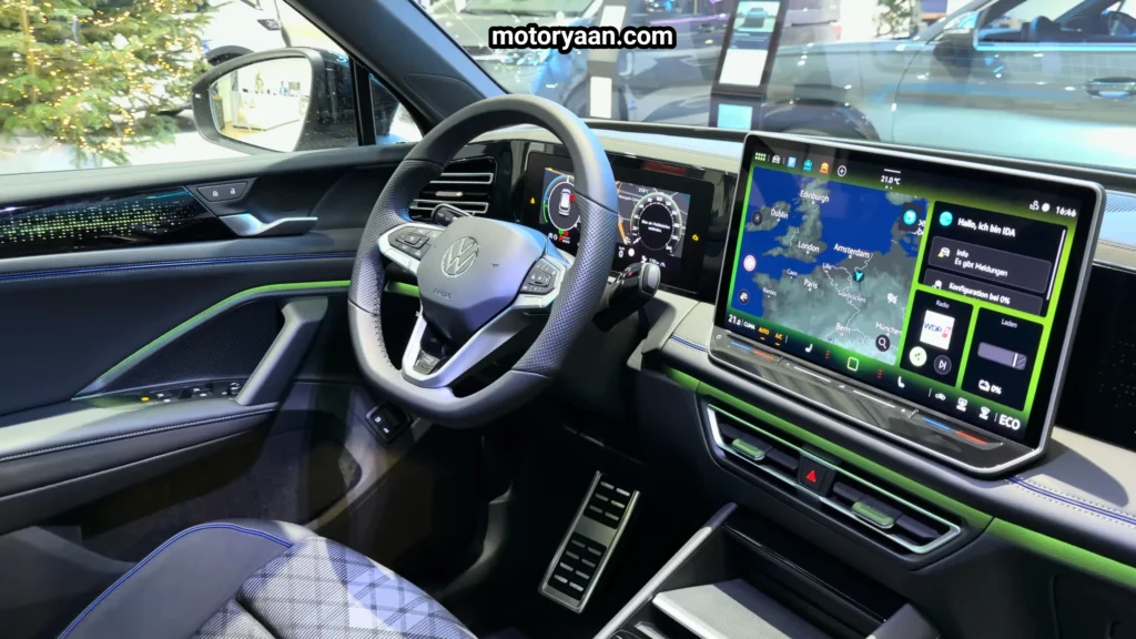 2026 Volkswagen Tiguan Turbo R-Line steering wheel with mounted controls and digital display