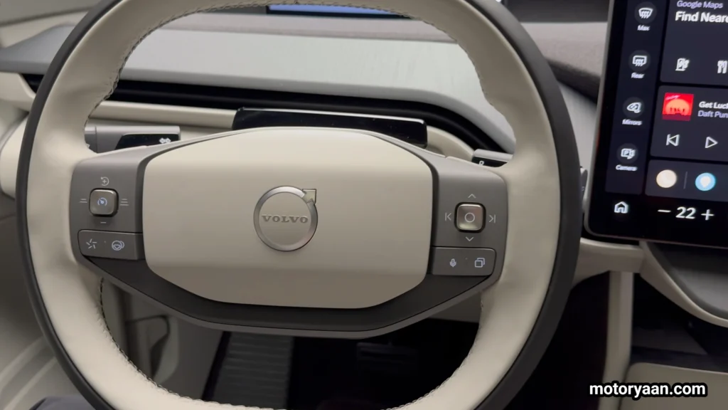 2027 Volvo EX60 steering wheel showing steering mounted controls