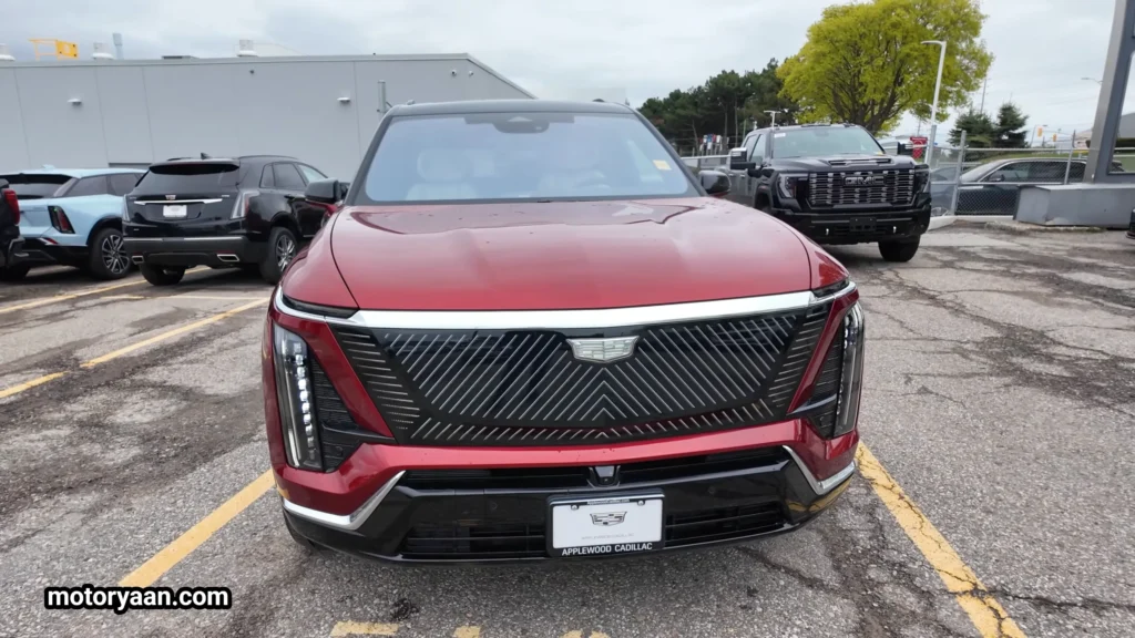 2026 Cadillac Vistiq front profile with illuminated grille and vertical LED headlights