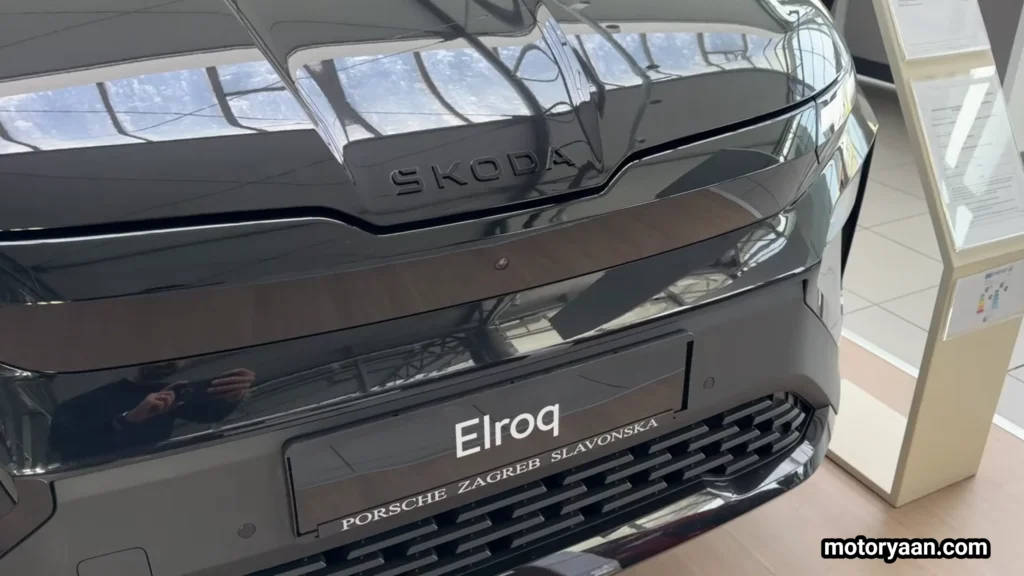 2026 Skoda Elroq Review close-up of Skoda badge and front grille mounted camera