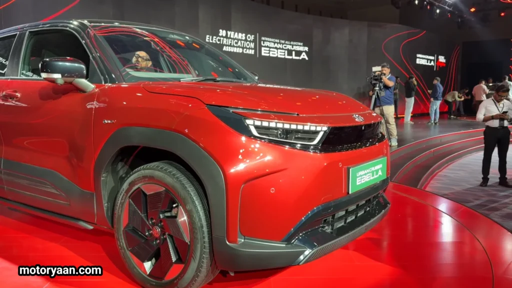 2026 Toyota Urban Cruiser Ebella close-up of LED headlamp and 18-inch alloy wheels