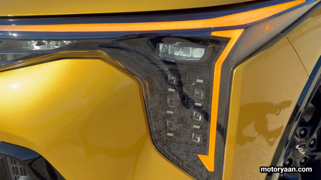 2026 Kia K4 GT Line Turbo LED headlights and daytime running lights close up
