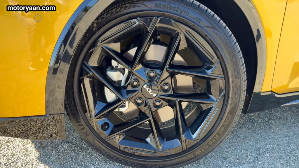 2026 Kia K4 GT Line Turbo alloy wheels close up with gloss black finish