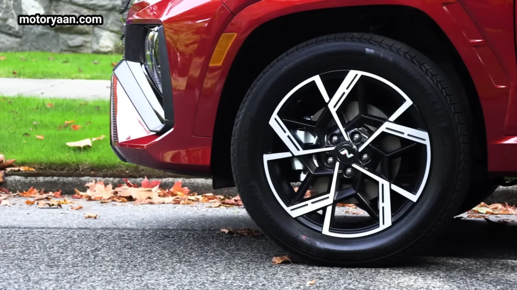2026 Hyundai Tucson Hybrid alloy wheel close-up with sporty multi-spoke design