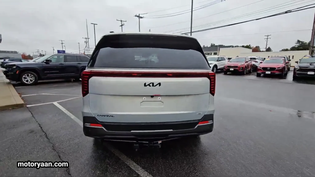 2026 Kia Carnival SX Prestige rear profile with LED tail lights and power tailgate