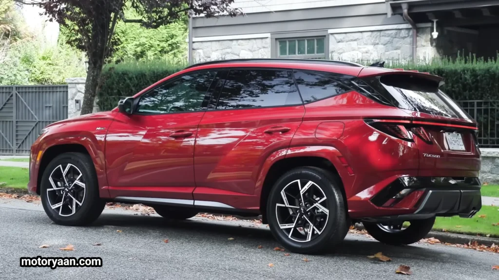 2026 Hyundai Tucson Hybrid side and rear profile with LED tail lamps and sculpted body