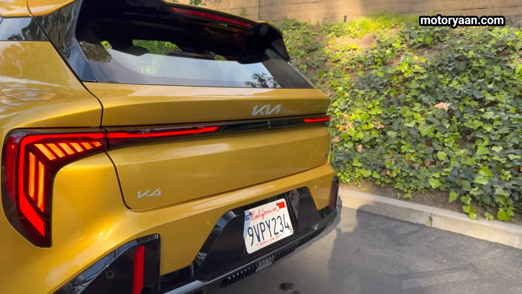 2026 Kia K4 GT Line Turbo rear profile with full width LED tail light design