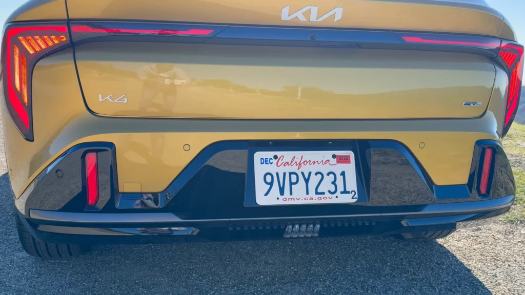 2026 Kia K4 GT Line Turbo rear bumper and LED tail lights close up