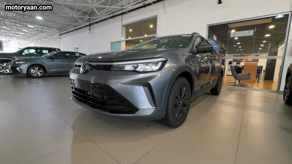 Volkswagen Nivus Sense 2026 front three quarter view showing grille, LED headlamps, and coupe style side profile Mahindra XUV 7XO Facelift Review