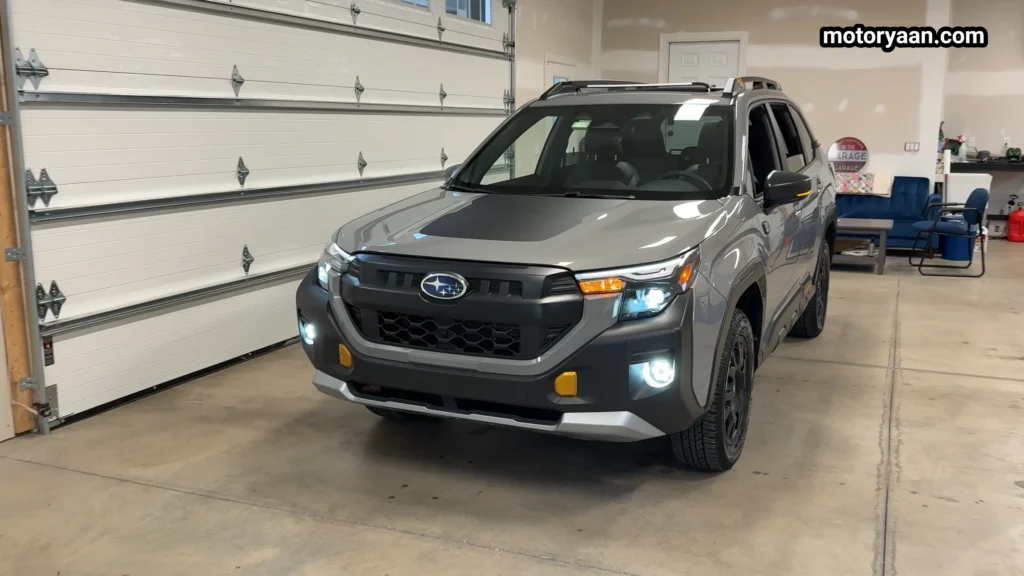 2026 Subaru Forester Wilderness front three quarter view with LED headlights and rugged bumper