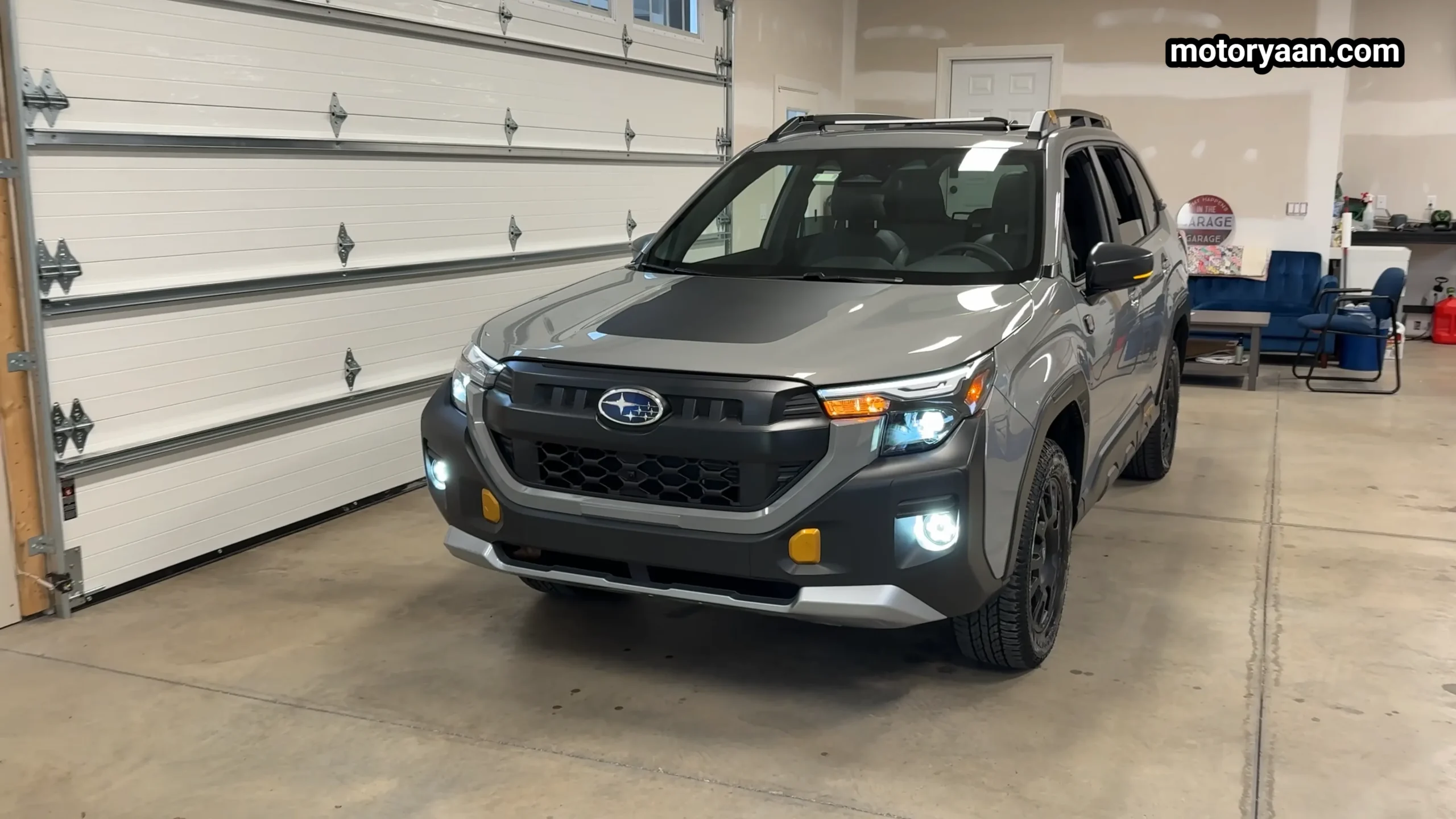 2026 Subaru Forester Wilderness front three quarter view with LED headlights and rugged bumper