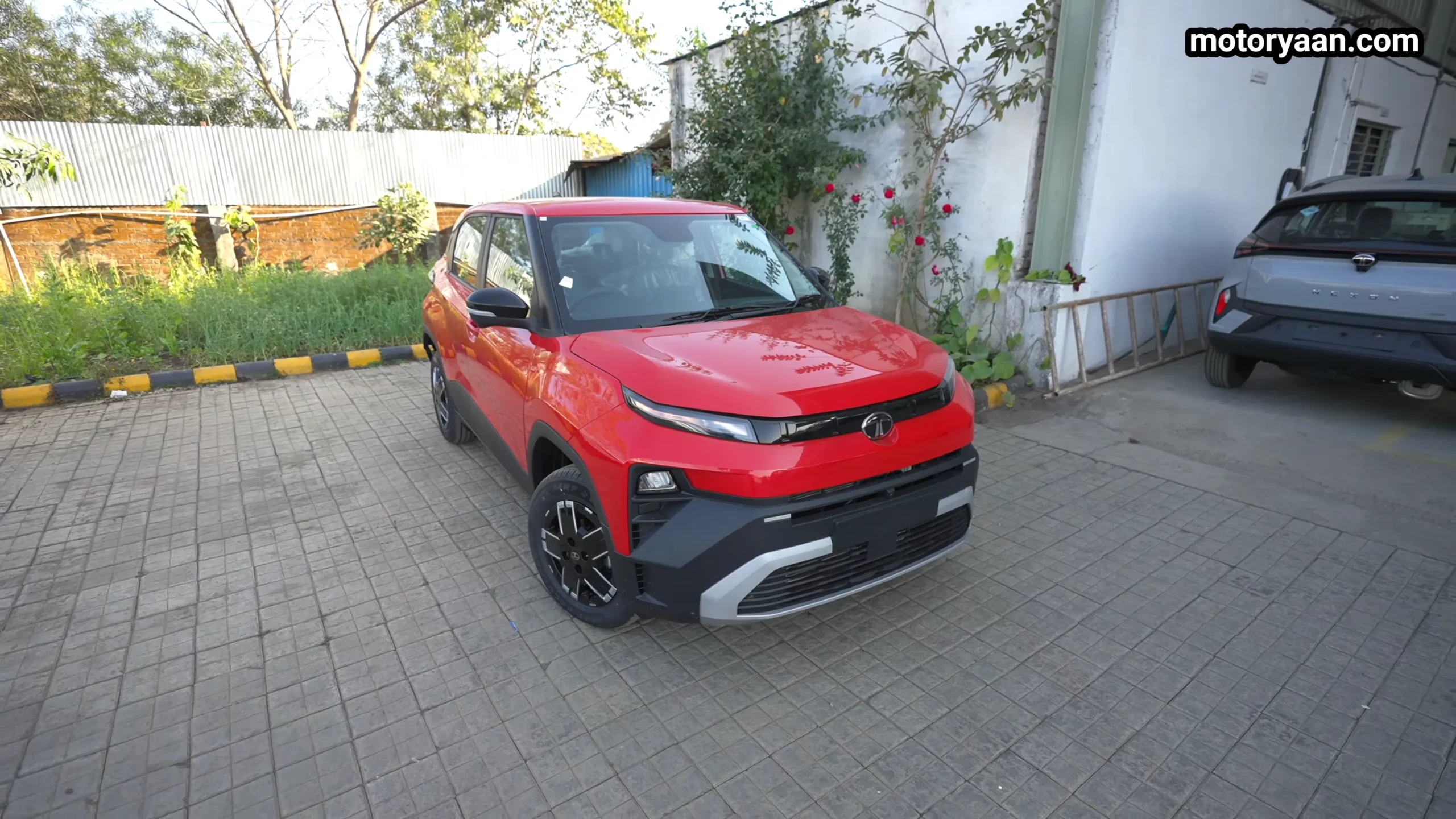 Tata Punch Adventure Variant front and side profile view in red