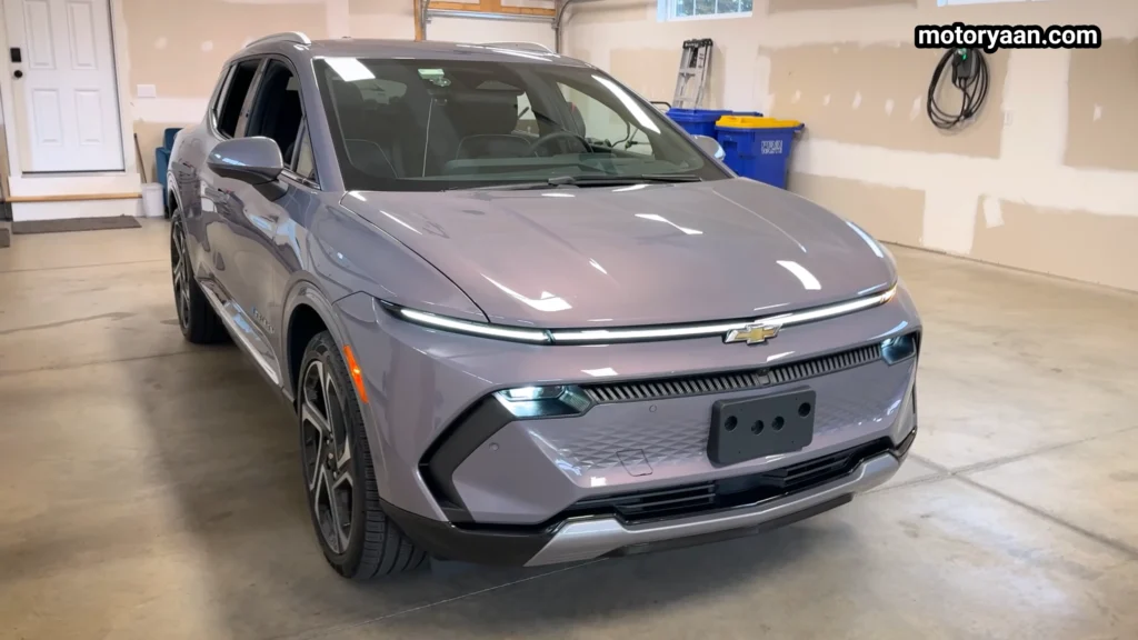 Front three quarter profile of the 2026 Chevrolet Equinox EV LT showing LED light bar and sculpted bonnet