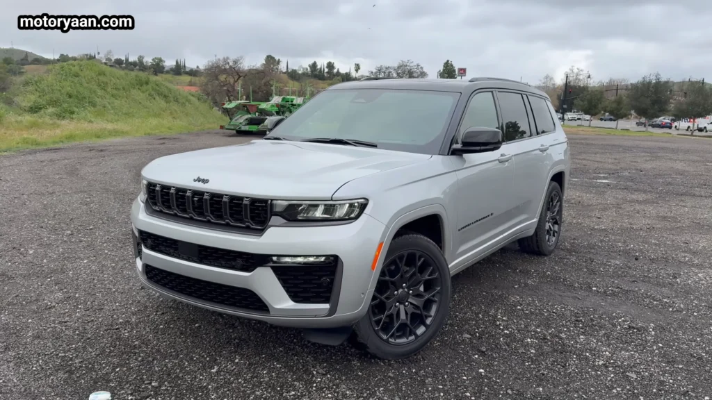 2026 Jeep Grand Cherokee L front three quarter view showing grille, LED headlights and side profile