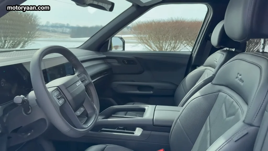 2027 Kia Telluride front cabin view with dashboard, seats, steering wheel, and center console