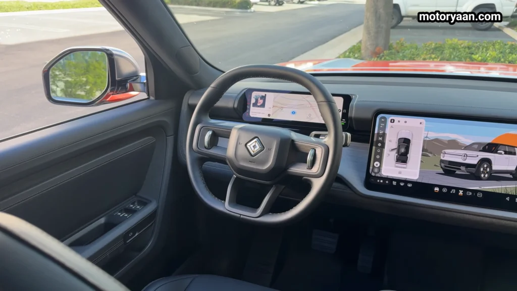 2026 Rivian R2 steering wheel instrument cluster and infotainment display