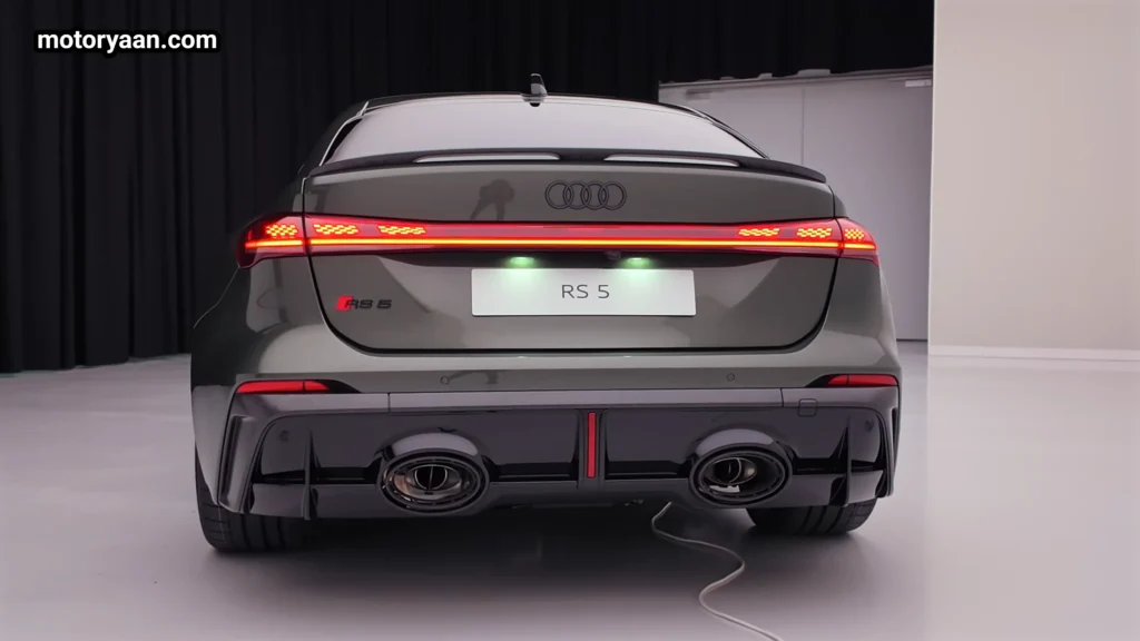 2026 Audi RS5 sedan rear profile with OLED tail lights and dual exhaust