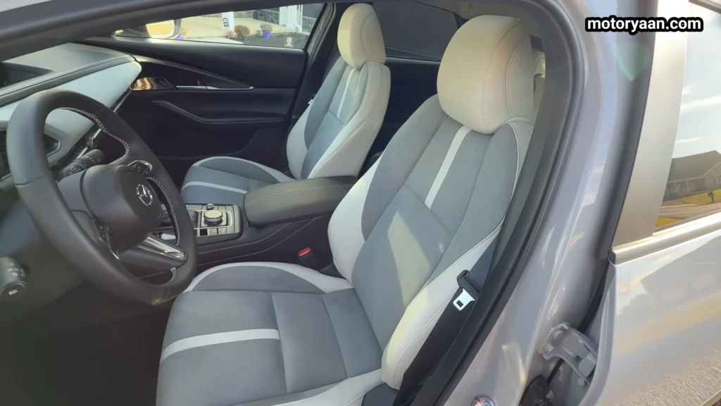 Front seats and center console of the 2026 Mazda CX30 Air Edition interior
