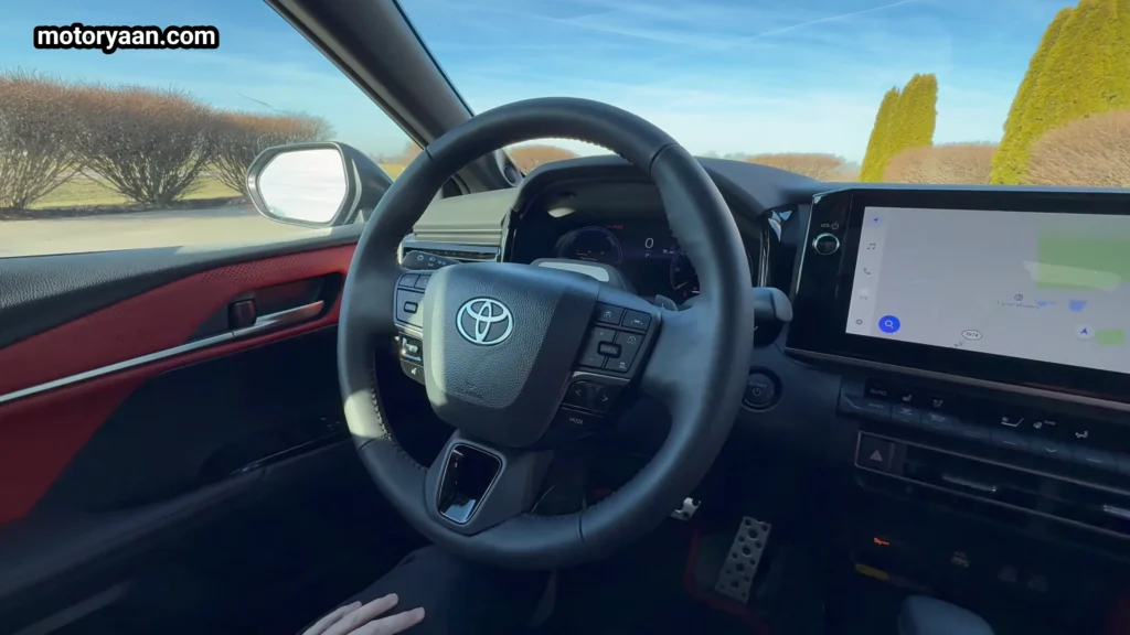 2026 Toyota Camry Hybrid steering wheel with mounted controls