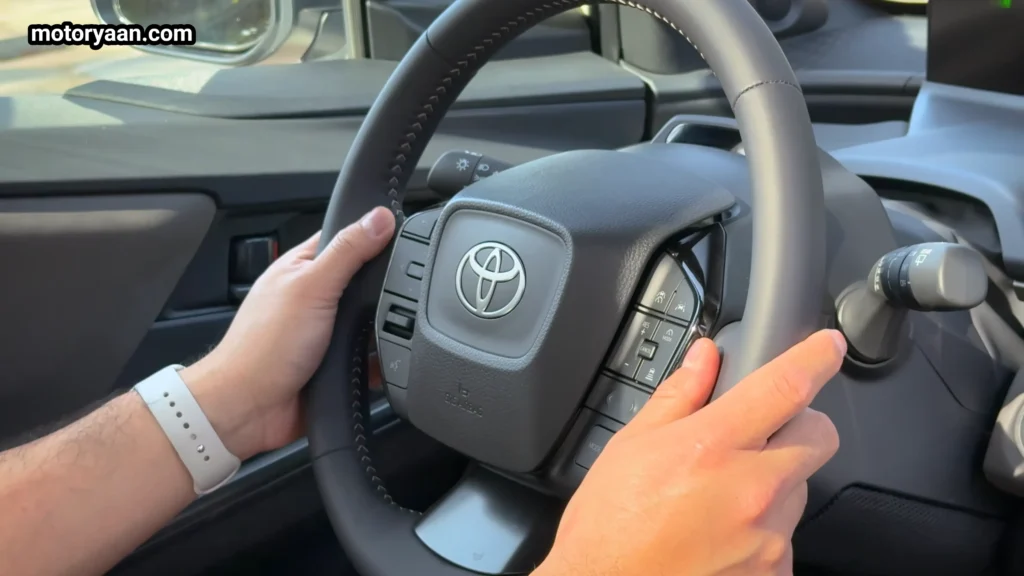 2026 Toyota bZ Woodland steering wheel with mounted controls and driver display