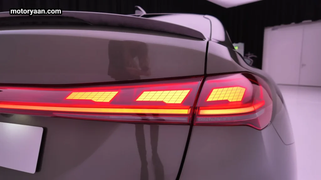 2026 Audi RS5 sedan OLED tail light close up with checkered flag design