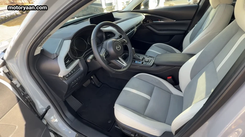 Dashboard and steering wheel inside the 2026 Mazda CX30 Air Edition