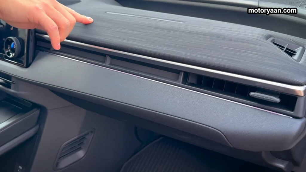 2026 Toyota CHR XSE passenger side dashboard with soft touch and textured materials