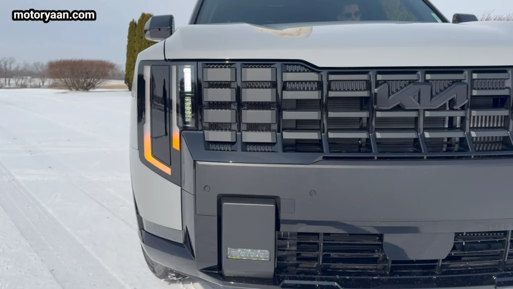 2027 Kia Telluride front fascia close up with LED headlights and grille