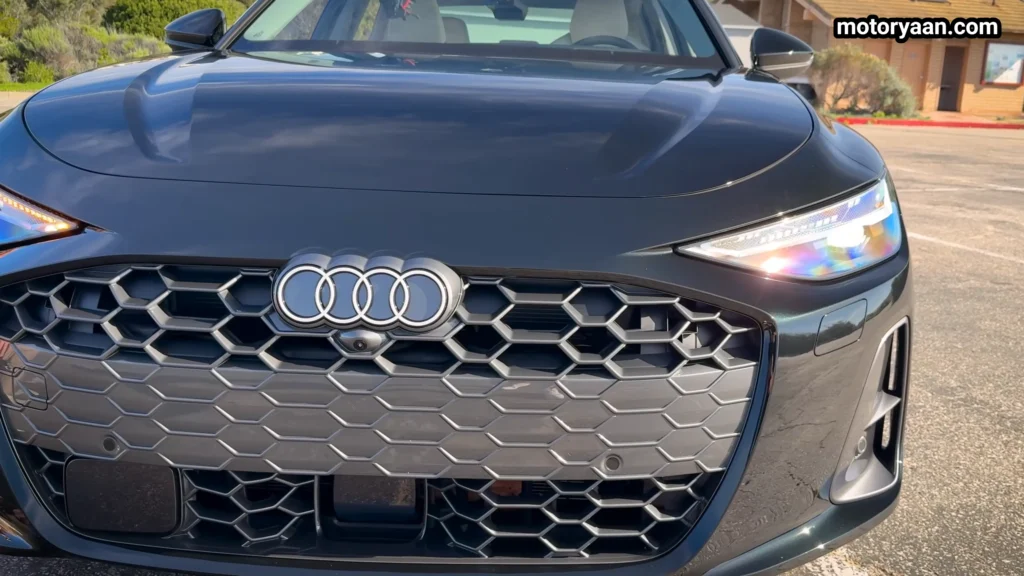 Close up of the 2026 Audi A6 TFSI front grille and LED headlight design