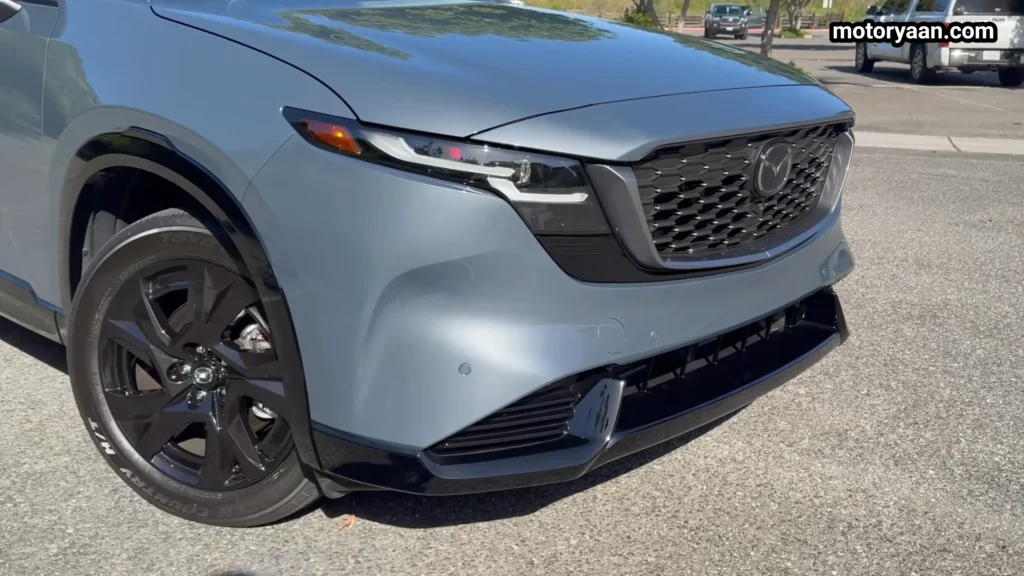 2026 Mazda CX 5 front corner with LED headlights and alloy wheels