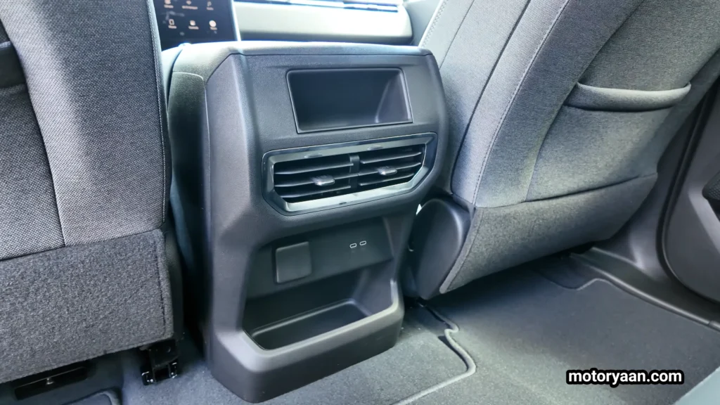 2026 GMC Sierra EV Elevation rear AC vent and charging ports