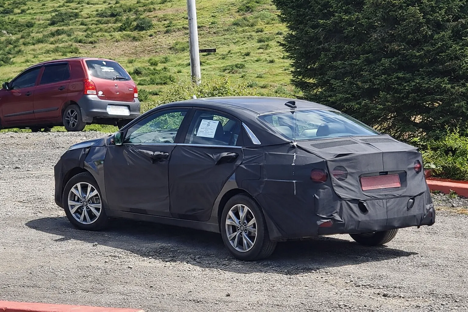 2026 Hyundai Verna facelift side and rear view during testing