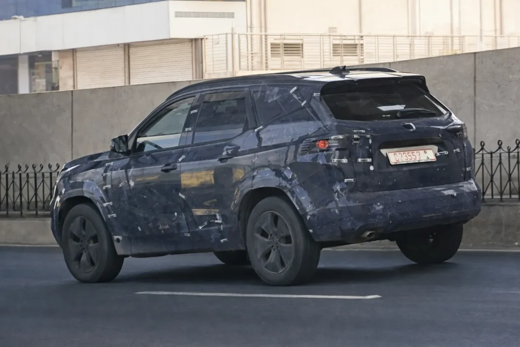 Nissan Tekton camouflaged test SUV side and rear profile spotted during testing