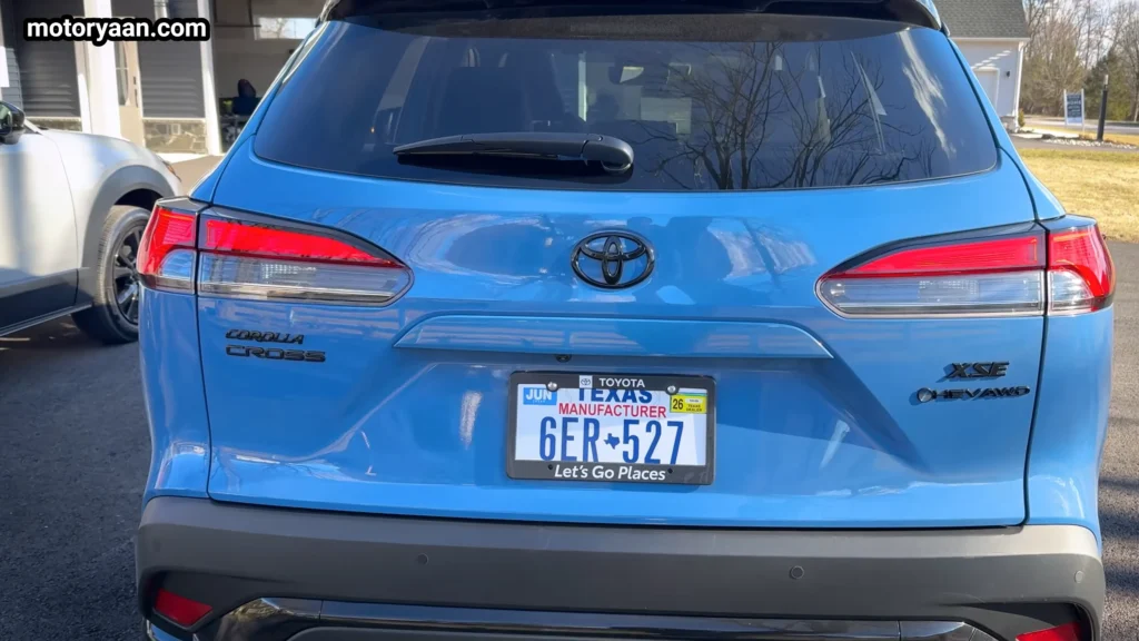 Toyota Corolla Cross Hybrid rear profile with LED tail lamps and SUV stance