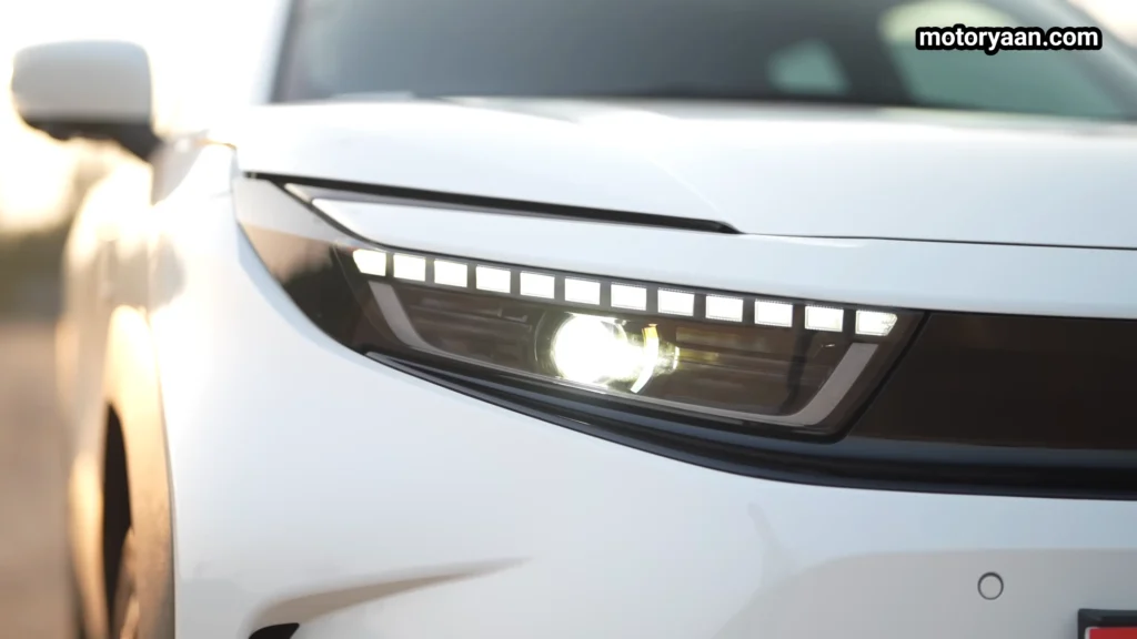 Toyota Urban Cruiser EVella headlight close up