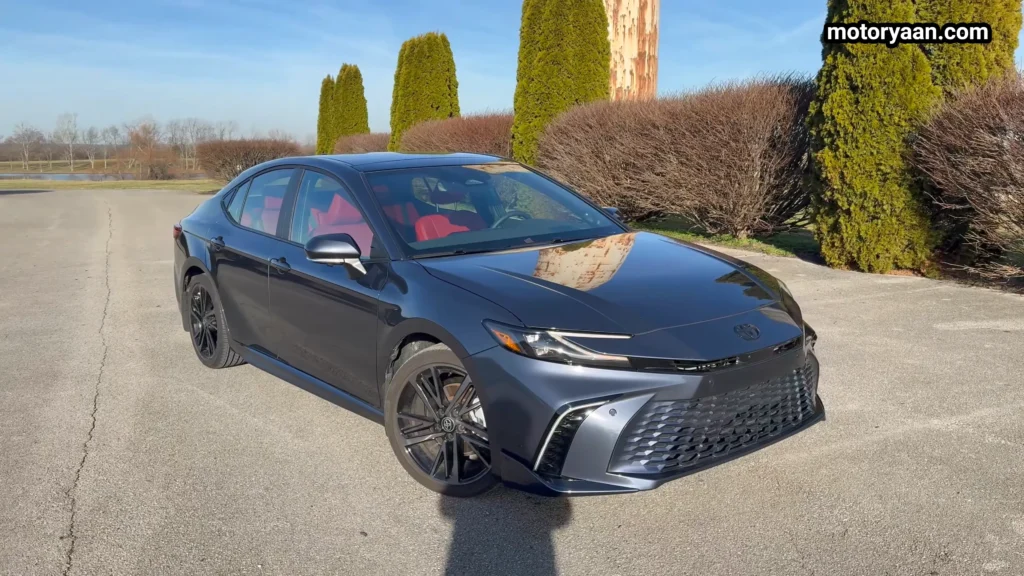 Blue 2026 Toyota Camry Hybrid front and side profile