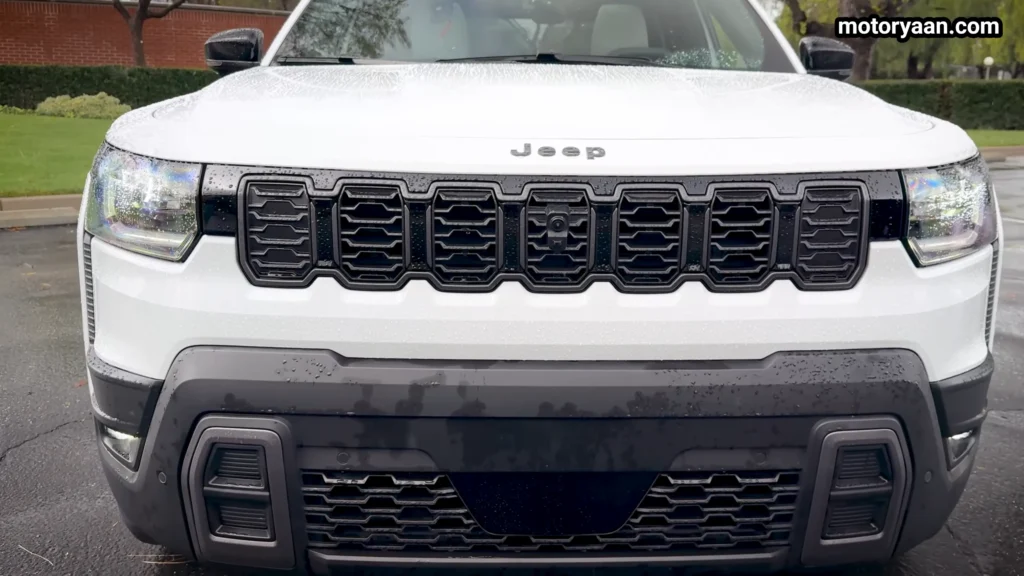 2026 Jeep Cherokee Hybrid close up of front grille and LED headlamp