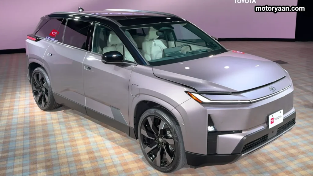 2027 Toyota Highlander EV front and side angle showing boxy electric SUV shape