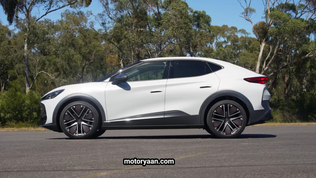 Cupra Tavascan VZ side profile showing coupe roofline and muscular wheel arches