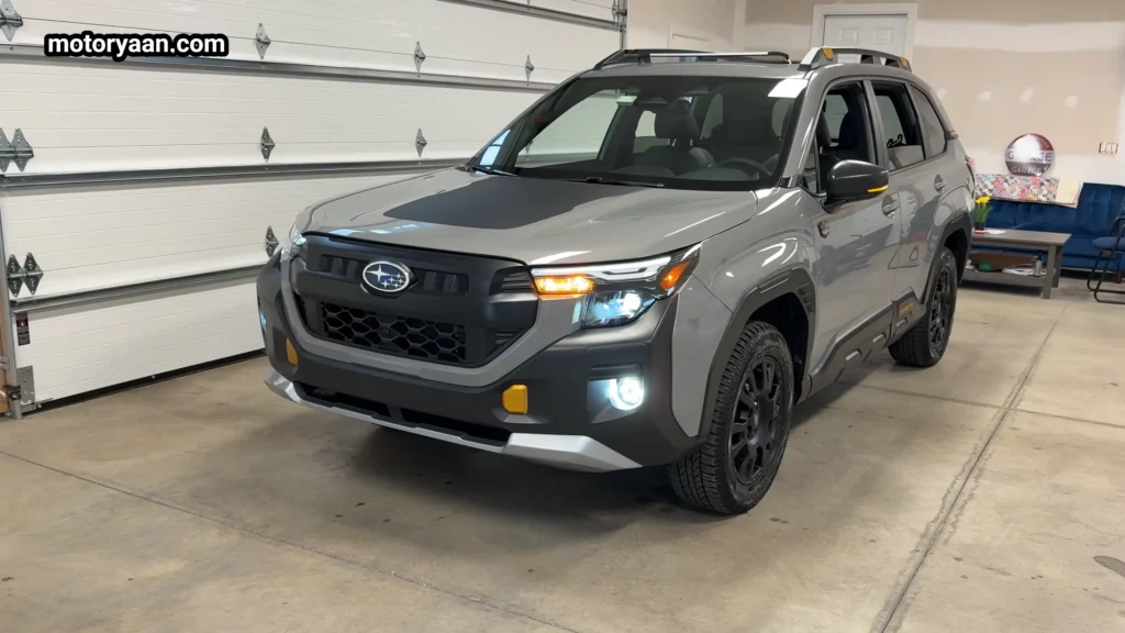2026 Subaru Forester Wilderness front and side profile with raised suspension and roof rails